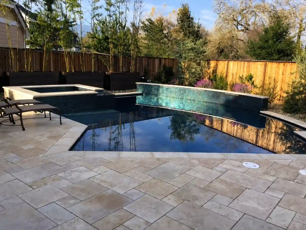How to Choose the Right Pool Finish Deck Material and Hardscape for Your Backyard